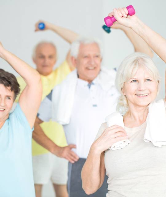 Seniors,Doing,Strength,Building,Fitness,Exercises,With,Dumbbells,,Holding,Their